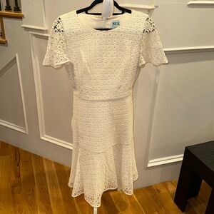 White textured dress with short flutter sleeves